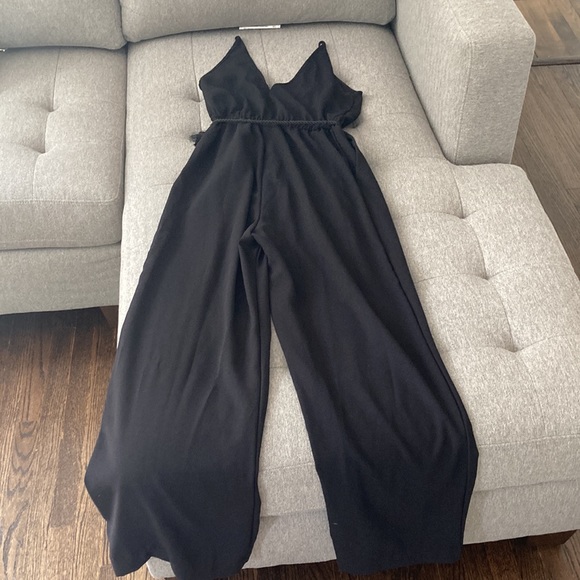 Black full length jumpsuit. NEW/NEVER WORN - Picture 2 of 3